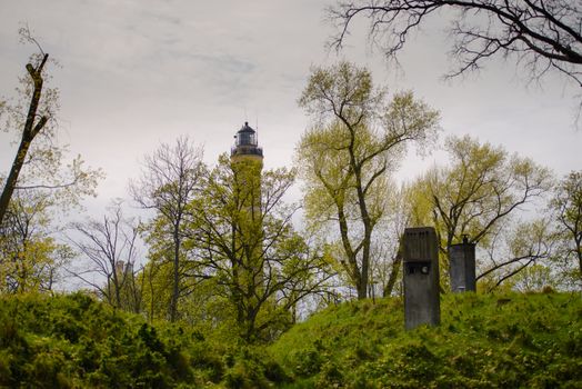 Polish flag hung on at historical lighthouse located in Swinoujscie, Poland, The construction was build in 1828 and height is 65 meters. 19th century. Top tallest Lighthouse in the World