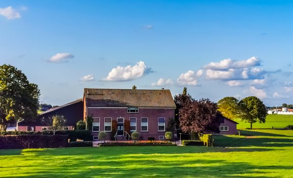 Modern house in the farmlands of rhenen, The netherlands, City architecture in rural scenery