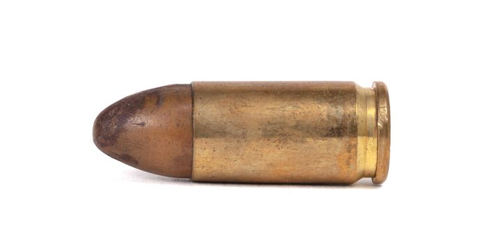 Very old bullet isolated on a white background