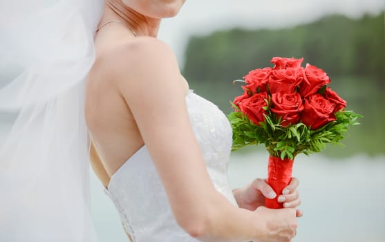 bouquet in the hands of the bride.