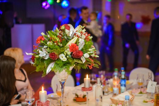 Beautifully decorated wedding table and other details at wedding hall. Wedding day