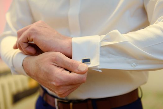 Groom's wedding accessories. Bow tie, suit, cufflinks, belt and shoes