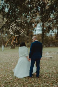 Bride and groom at a photo session in the nature.