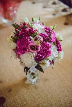 bouquet in the hands of the bride.