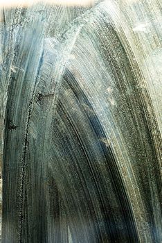 Backlit dirty glass texture, abstract grungy background