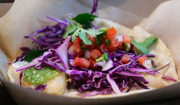 Red Cabbage on Veggie Tacos in Take Away Containers