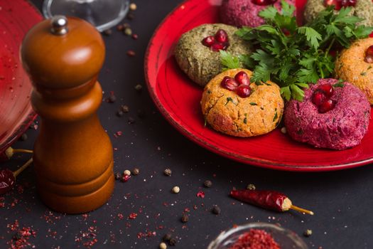 Georgian food on black table. Phali and adjika 