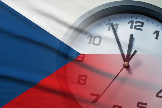 Composite of the Czech Republic flag and a clock face counting down to twelve midnight or noon in a conceptual image