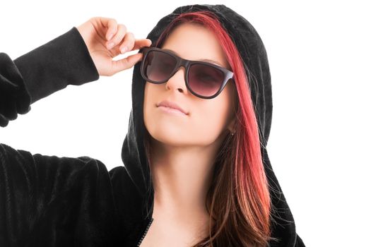 Beautiful stylish girl with black hoodie and sunglasses, isolated on white background. Tomboy female with black hoody and sunglasses. Rebel concept.