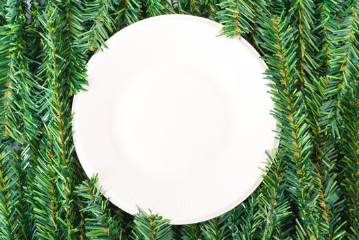 Happy New Year and Christmas day, top view flat lay composition decoration branches tree, white round on white background with copy space for your text