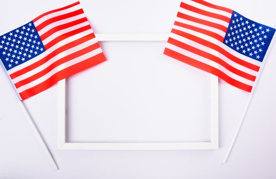 Martin luther king day, flat lay top view, American flag and photo frame on white background with copy space for your text