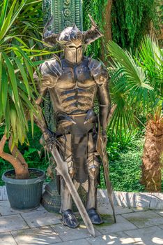 Ravadinovo, Bulgaria – 07.11.2019.  Sculpture of a knight in armor in the castle of Ravadinovo, Bulgaria, on a sunny summer day