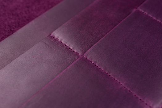 Purple handmade leather wallet details closeup. Pockets for cards, hue picture.