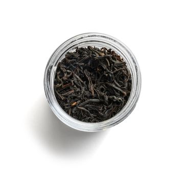 Black tea top view on white background.