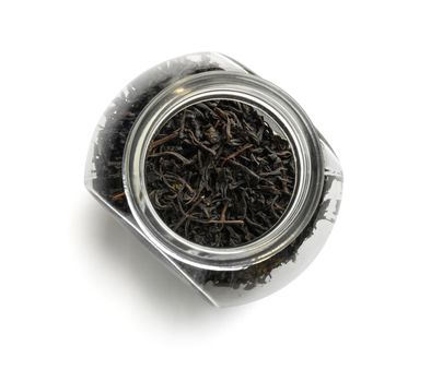 Black tea top view on white background.