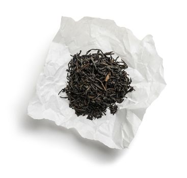 Black tea top view on white background.