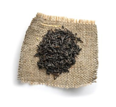 Black tea top view on white background.