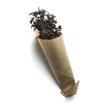 Black tea top view on white background.