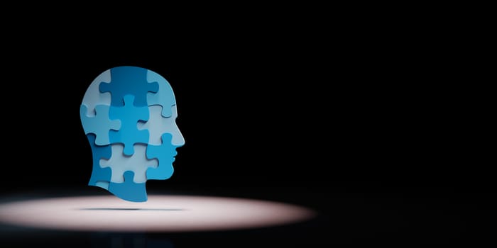 Blue Human Puzzle Head Shape Spotlighted on Black Background with Copy Space 3D Illustration