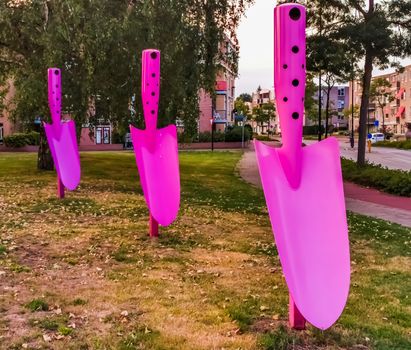 pink metal scoop sculptures in the city of apeldoorn, Gardening decoration