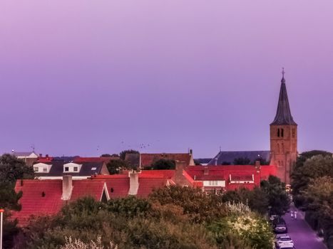 skyline of some dutch cottages and the church of domburg city, Zeeland, The Netherlands