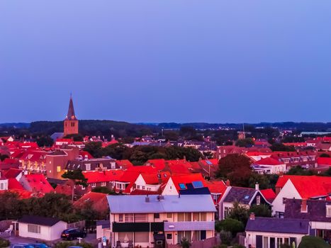 skyline of domburg city with church tower and many houses, Zeeland, The netherlands