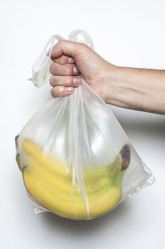 Some bananas in a plastic bag