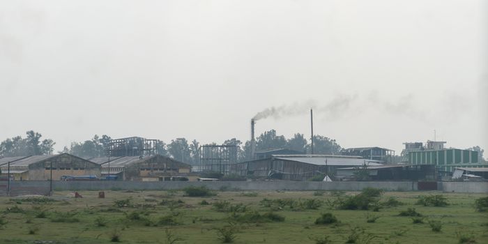 A Small and medium sector Village industries area surrounded by rural agricultural field and summer meadow. An industrial environment of Countryside West Bengal, India, south Asia pacific.
