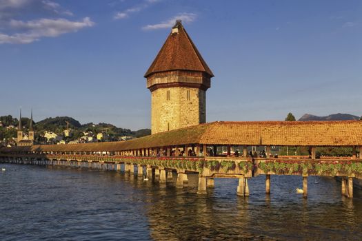 Kapellbrucke Chapel covered Bridge and Water Tower in Luzern by day, Switzerland