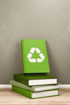 Book with Recycle Symbol on the Cover on top of a Pile of Green Books in the Room with Copyspace 3D Render