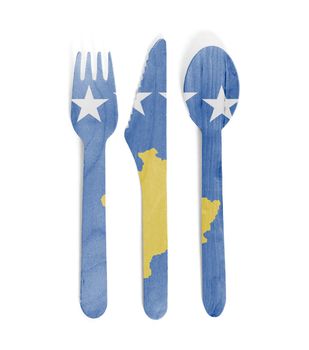 Eco friendly wooden cutlery - Plastic free concept - Isolated - Flag of Kosovo