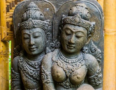 sculpture of a spiritual male and female together, traditional art work and decoration