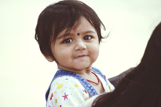 A cute Baby Girl in Joy Mood