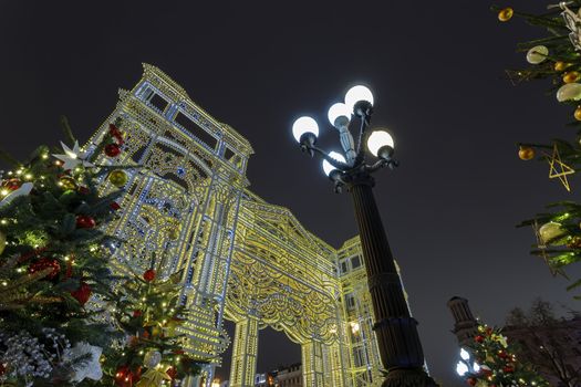 The city is decorated with festive illumination for the New Year. Excursions to New Year's Moscow. Celebrations in Moscow. Christmas lights on the buildings. The decorated capital. A trip to Russia. Christmas tree.