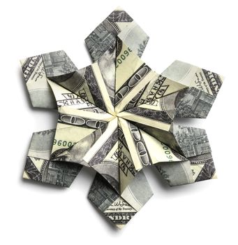 A 100 dollar bill in the shape of a snowflake on a white background.