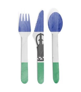 Eco friendly wooden cutlery - Plastic free concept - Isolated - Flag of Lesotho