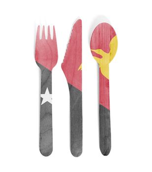 Eco friendly wooden cutlery - Plastic free concept - Isolated - Flag of Papua New Guinea