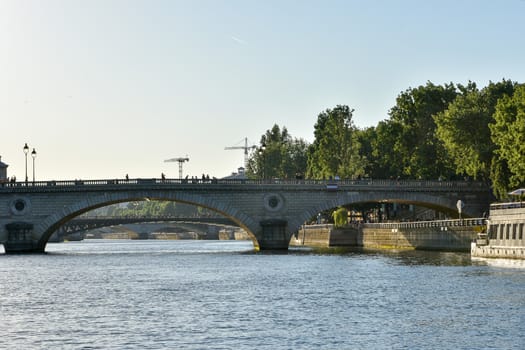 visit of Paris, Seine quay and Eiffel tower, walk in the parks of the capital of France in summer