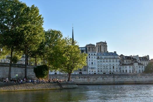 visit of Paris, Seine quay and Eiffel tower, walk in the parks of the capital of France in summer