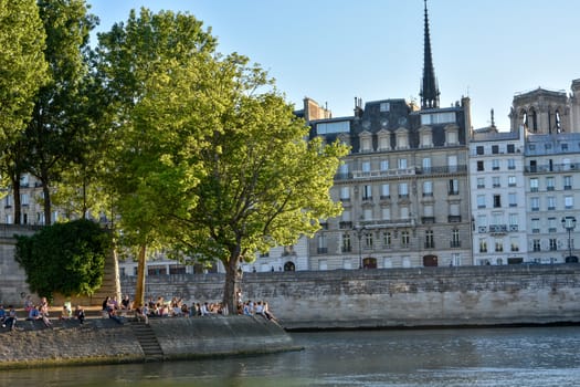 visit of Paris, Seine quay and Eiffel tower, walk in the parks of the capital of France in summer