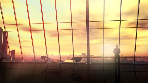 Silhouette of a businessman looking out of the window of a large office against the backdrop of the cityscape at sunset.