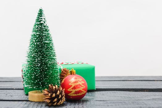 Christmas composition decorations, minimal green fir tree branches with snow on white background. Merry Christmas concept. Copy space for text