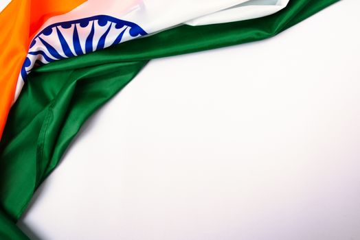 Indian republic day, flat lay top view, Indian tricolor flag on white background with copy space for your text