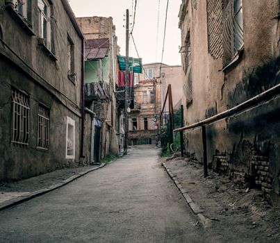 slum old town street with ruined shacks in Georgia country