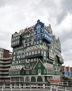 Facade of modern hotel with structure of traditional dutch buildings in Zaandam, Netherlands