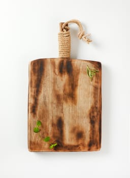 Rustic wooden cutting or serving board with handle