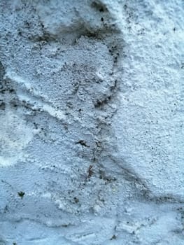 Grungy background of natural old stone texture. Stone wall close up