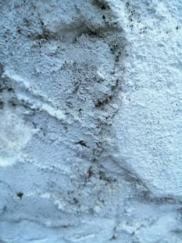 Grungy background of natural old stone texture. Stone wall close up