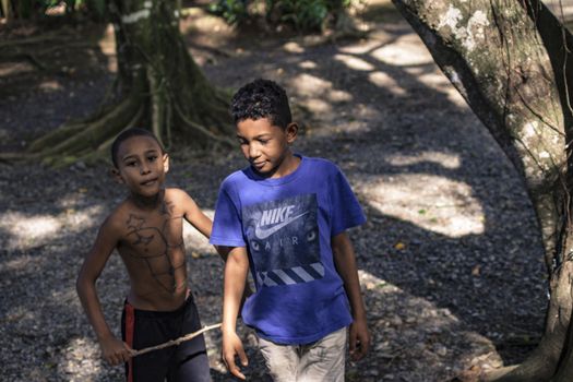 MONTANA REDONDA, DOMINICAN REPUBLIC 27 DECEMBER 2019: Young Dominican boys in a poor farm