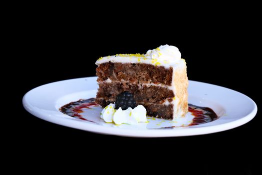 Carrot Cake on Plate and Black Background